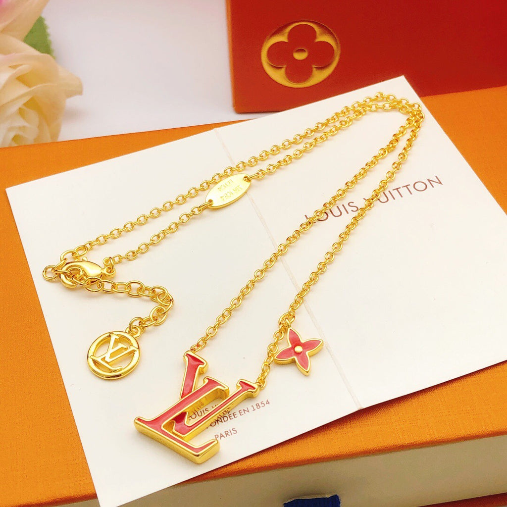 Geometric Emblem Pendant Necklace in Gold-Tone – Red Detail styled product view
