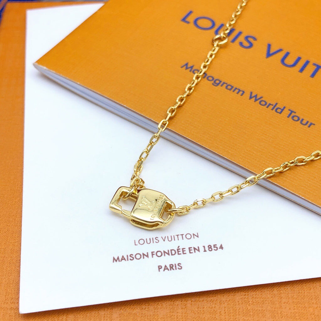 Geometric Emblem Pendant Necklace in Gold-Tone – White Detail close-up detail
