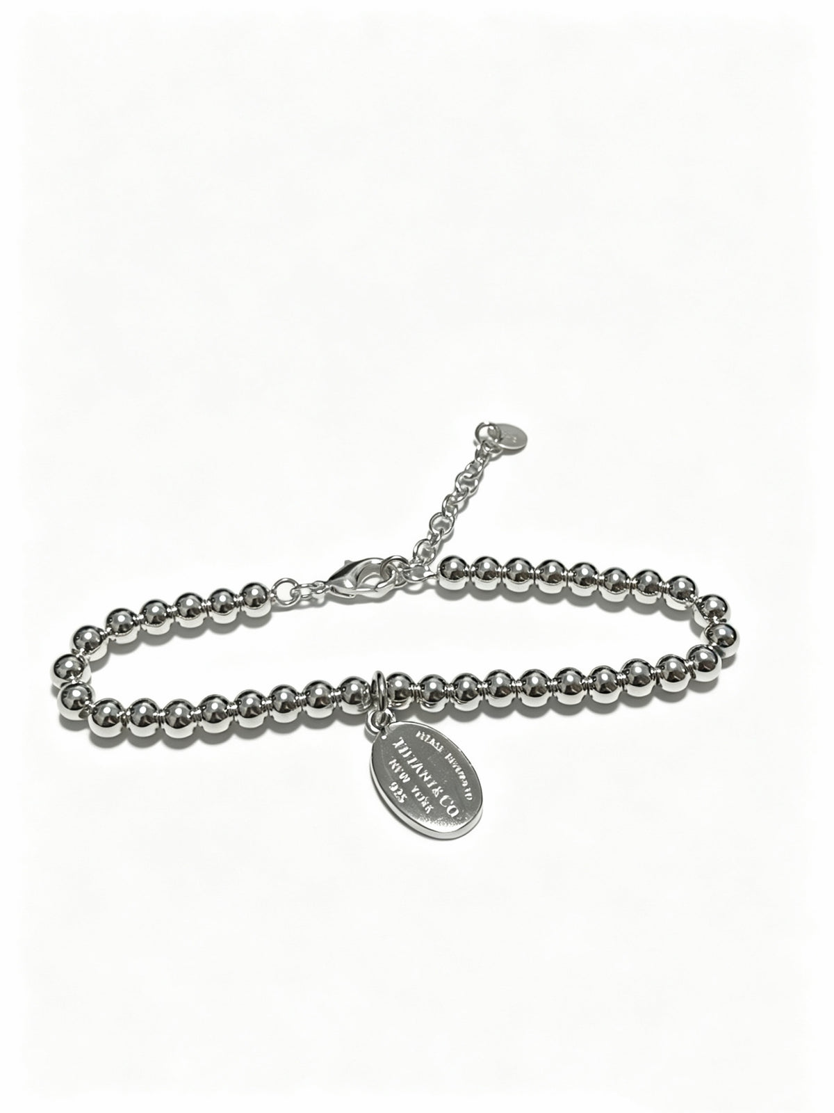 Signature Motif Bracelet in Silver-Tone – Vintage Detail front product view