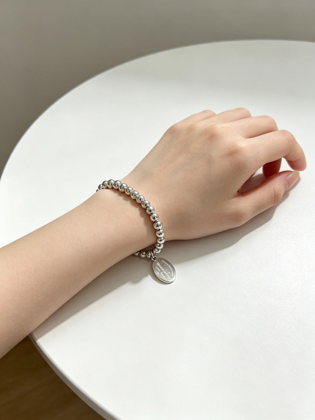 Signature Motif Bracelet in Silver-Tone – Vintage Detail front product view