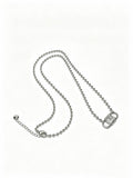 Signature Motif Pendant Necklace in Silver-Tone – Vintage Detail main product view