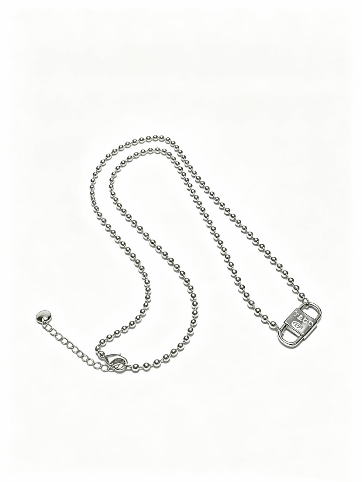 Signature Motif Pendant Necklace in Silver-Tone – Vintage Detail main product view