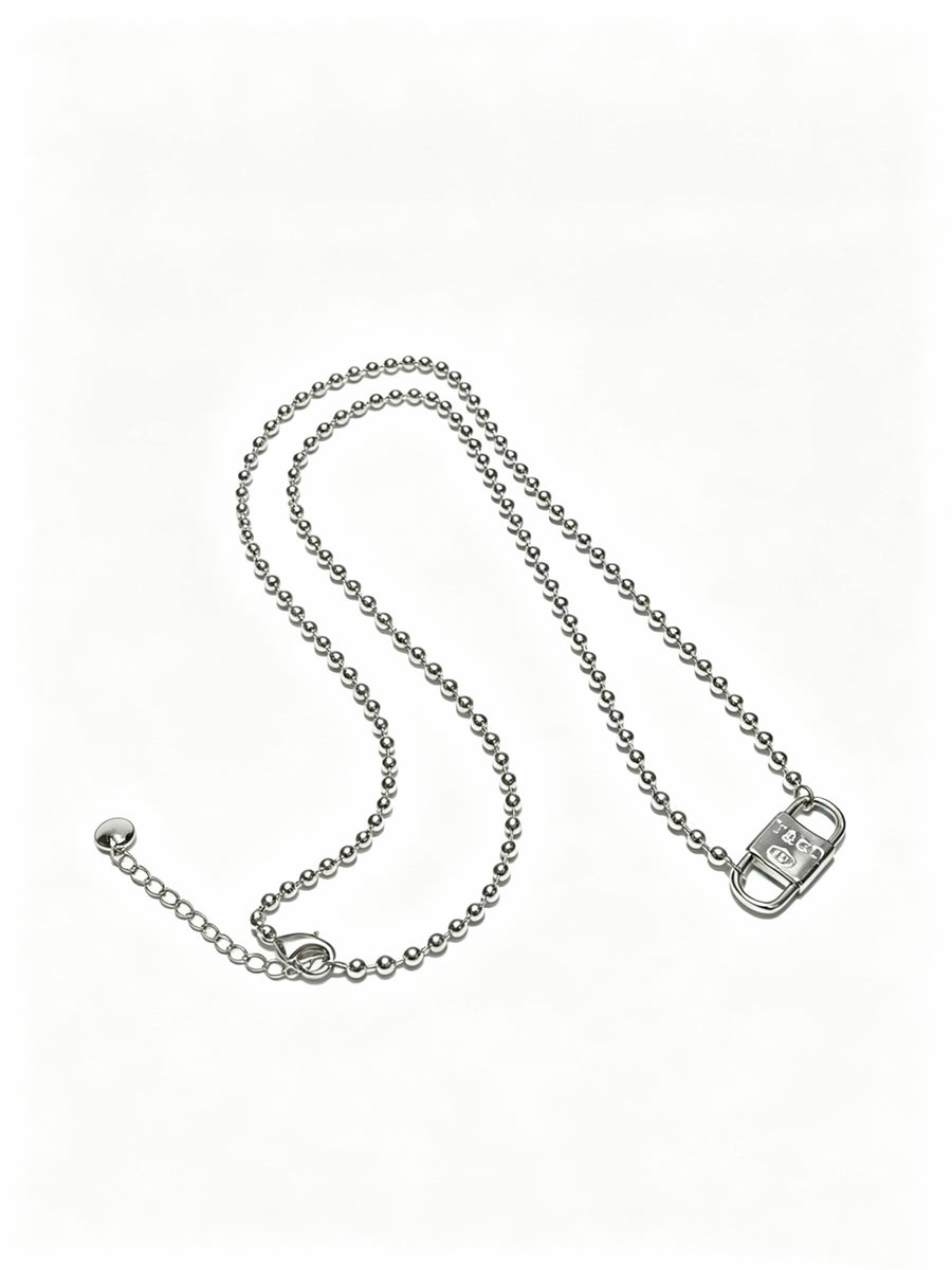 Signature Motif Pendant Necklace in Silver-Tone – Vintage Detail main product view