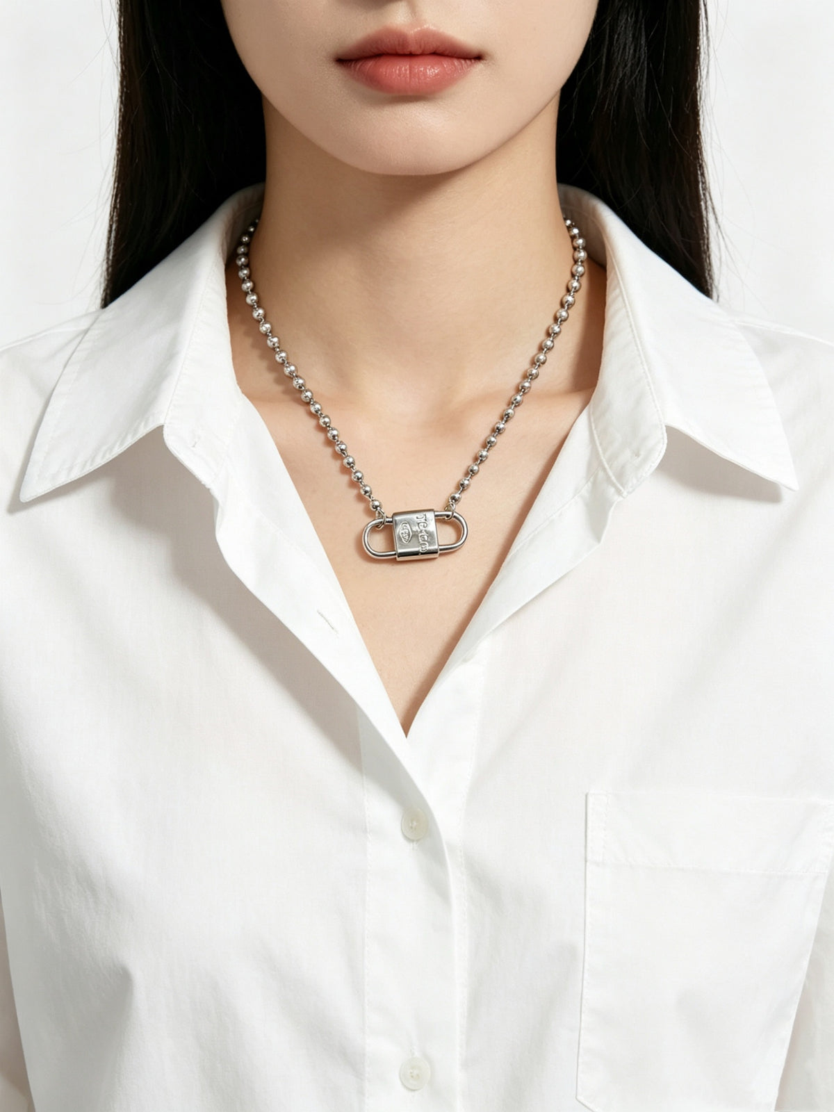Signature Motif Pendant Necklace in Silver-Tone – Vintage Detail detail view