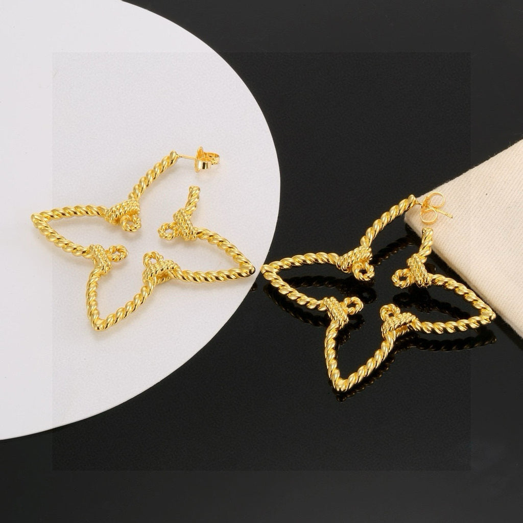 Clover Stud Earrings in Polished Metal-Tone – Clover Detail styled product view