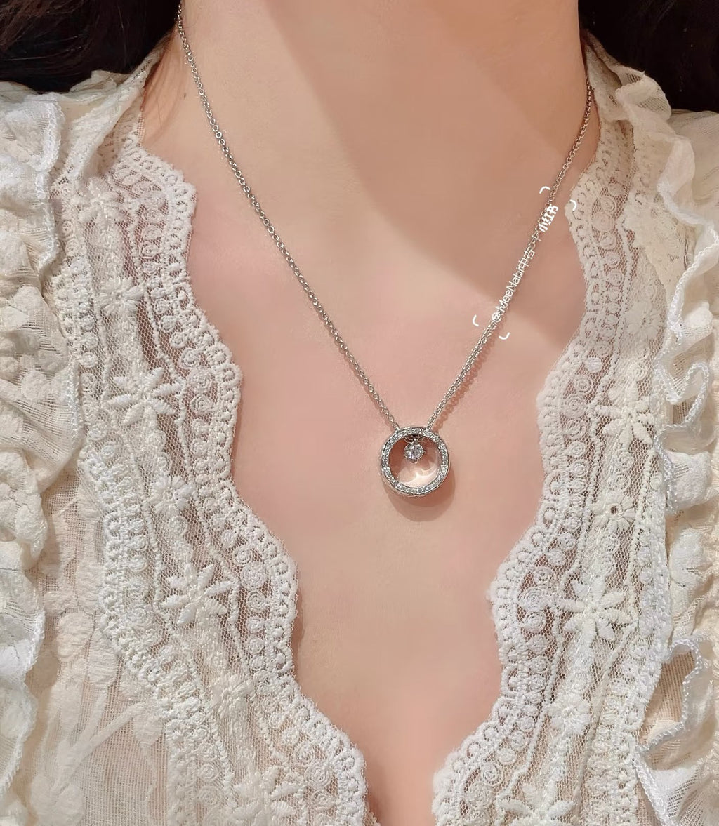 Signature Emblem Pendant Necklace in Polished Metal-Tone – Red Detail detail view