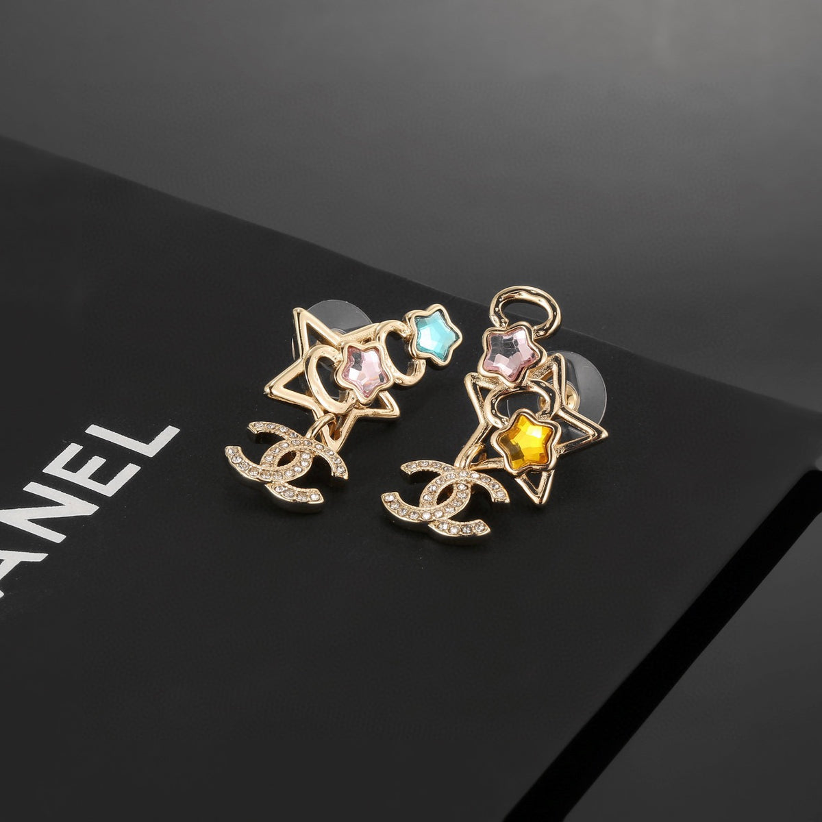 Double-C Emblem Stud Earrings in Gold-Tone – Star Detail – Design 002 styled product view