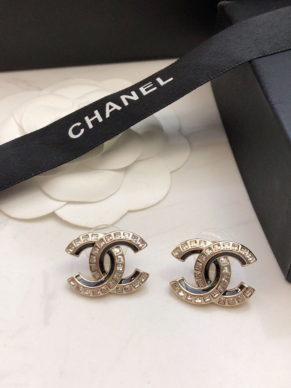 Double-C Emblem Crystal-Accent Stud Earrings – Black Detail front product view