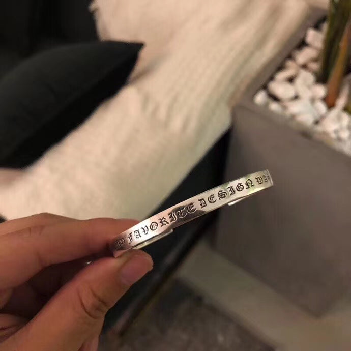 Signature Emblem Bangle in Polished Metal-Tone – Design 015 detail view
