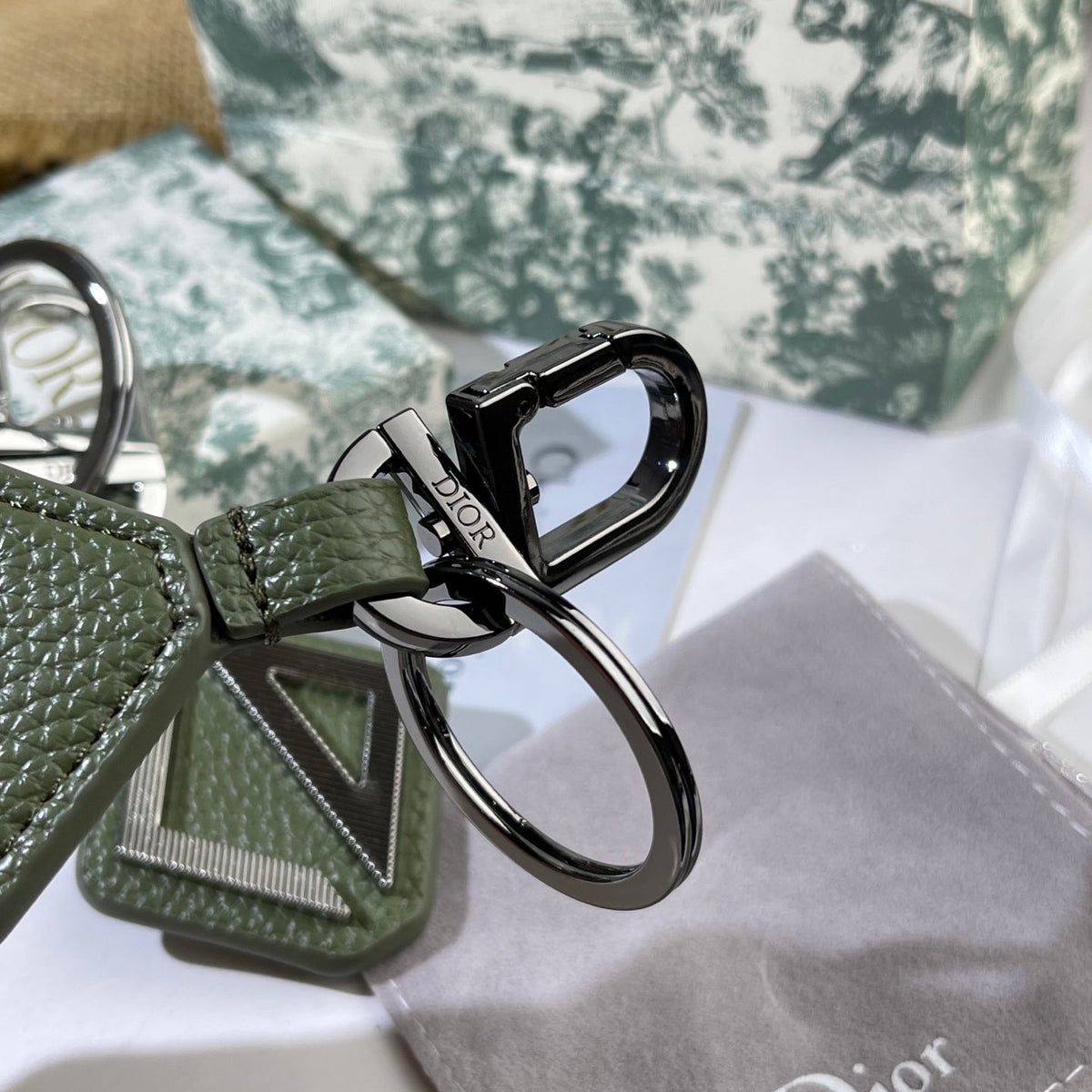 Martin Graham bag charm in polished metal-tone – side detail