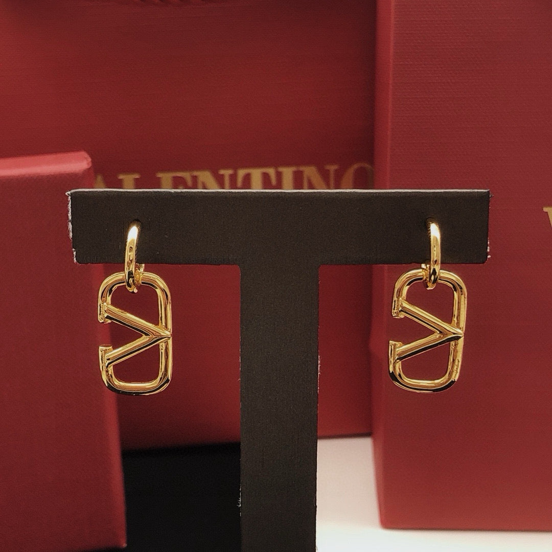 Martin Graham drop earrings in polished metal-tone – side detail