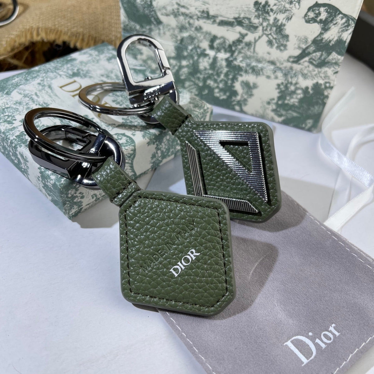 Martin Graham bag charm in polished metal-tone – close-up detail