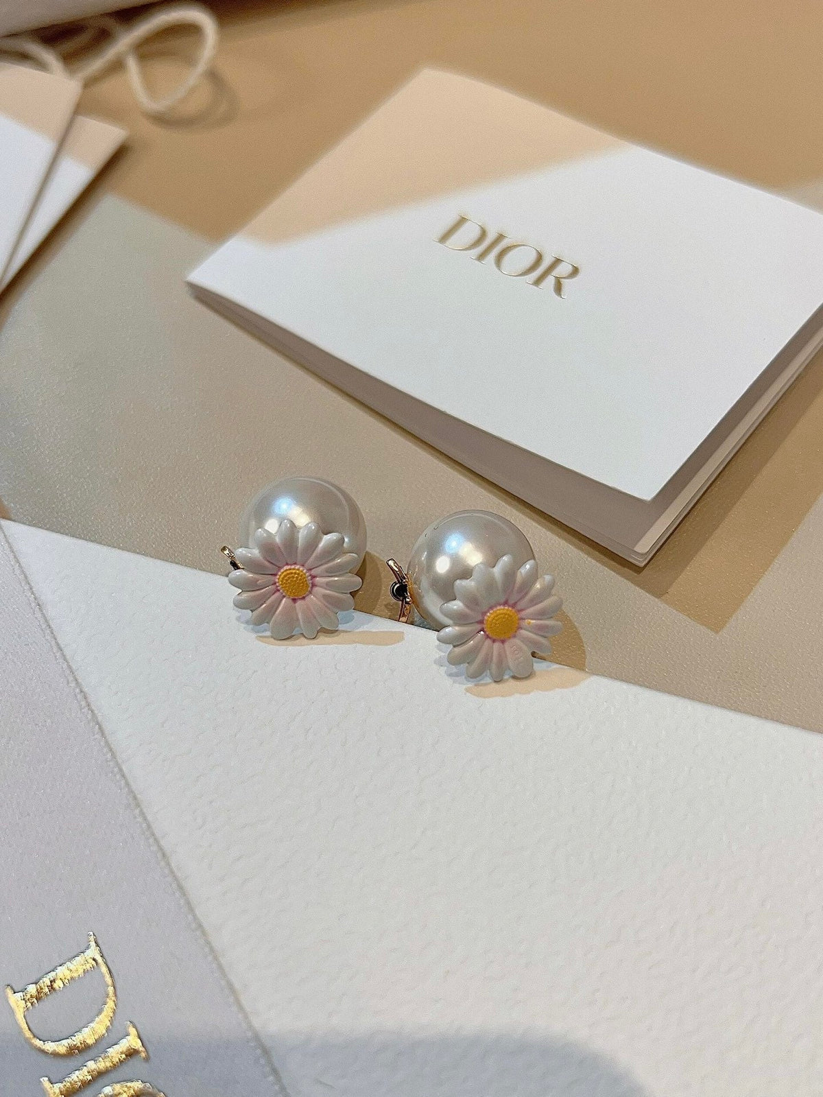 Martin Graham stud earrings in polished metal-tone – main product view