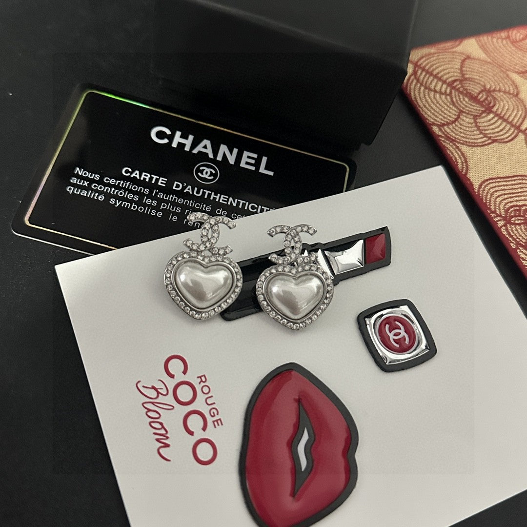 Martin Graham stud earrings in polished metal-tone – main product view
