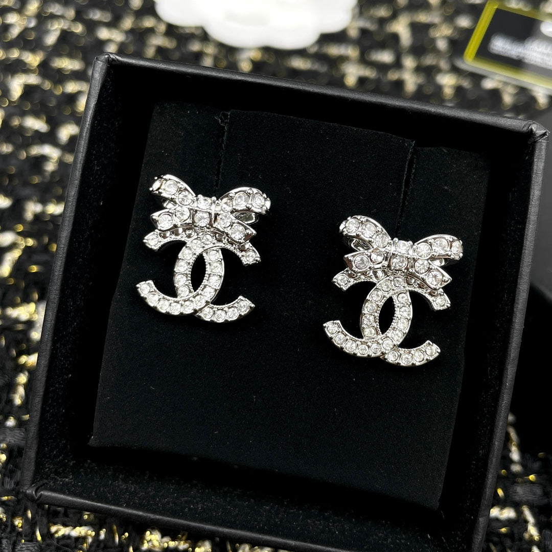Martin Graham stud earrings in polished metal-tone – main product view
