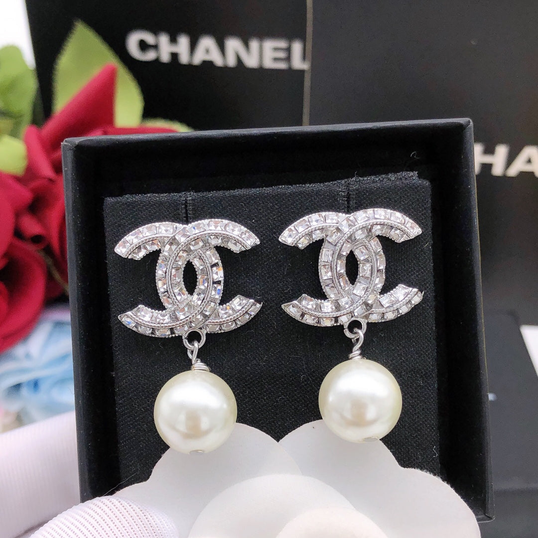 Martin Graham stud earrings in polished metal-tone – main product view