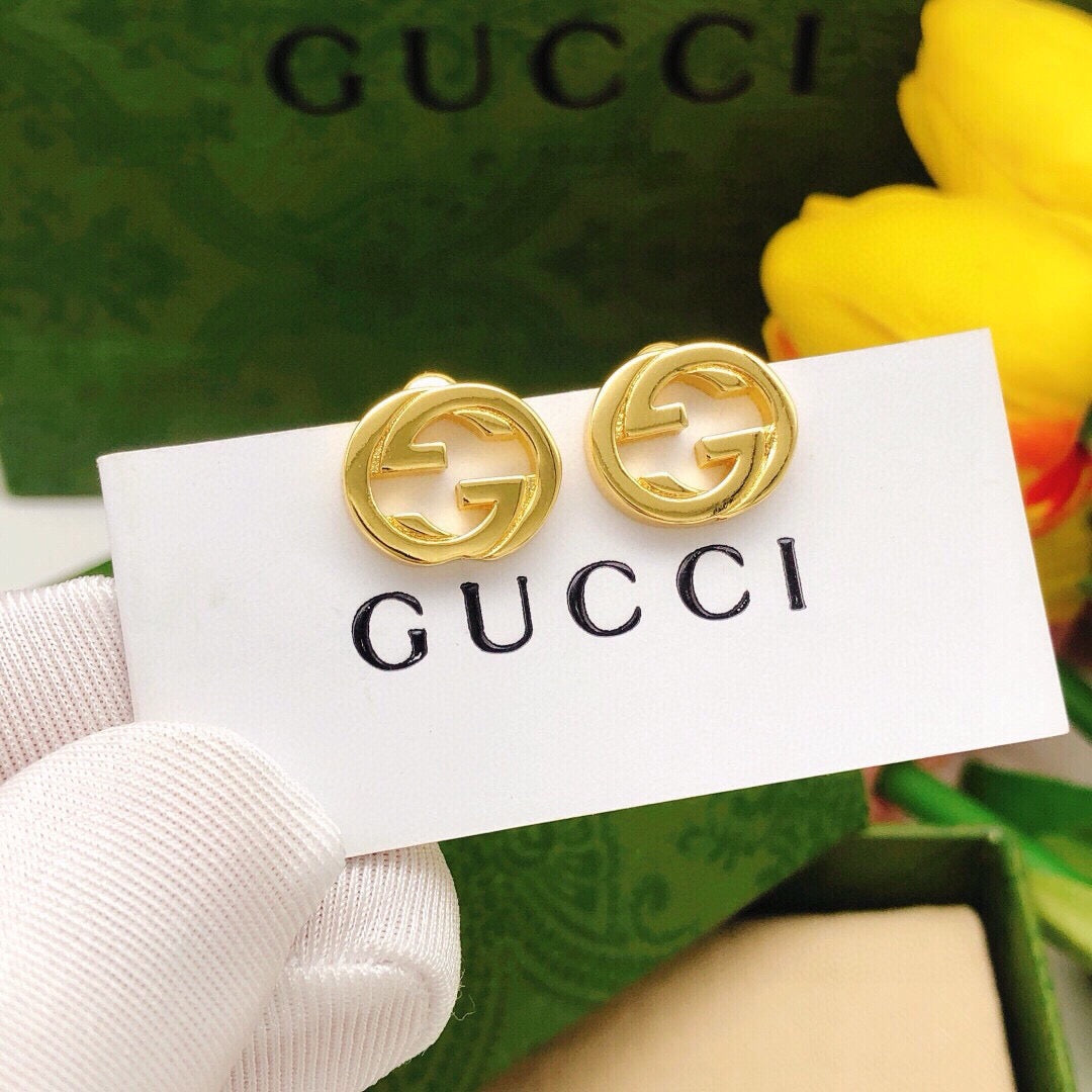 Martin Graham stud earrings in polished metal-tone – main product view