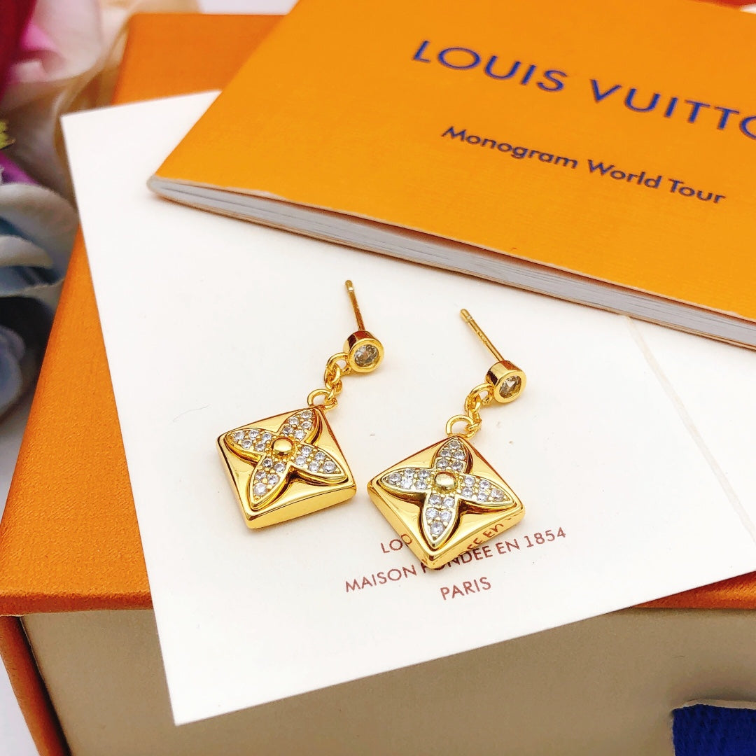 Martin Graham stud earrings in polished metal-tone – main product view