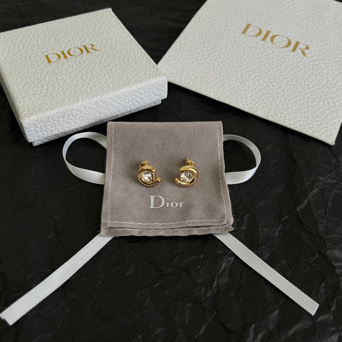 Martin Graham stud earrings in polished metal-tone – main product view