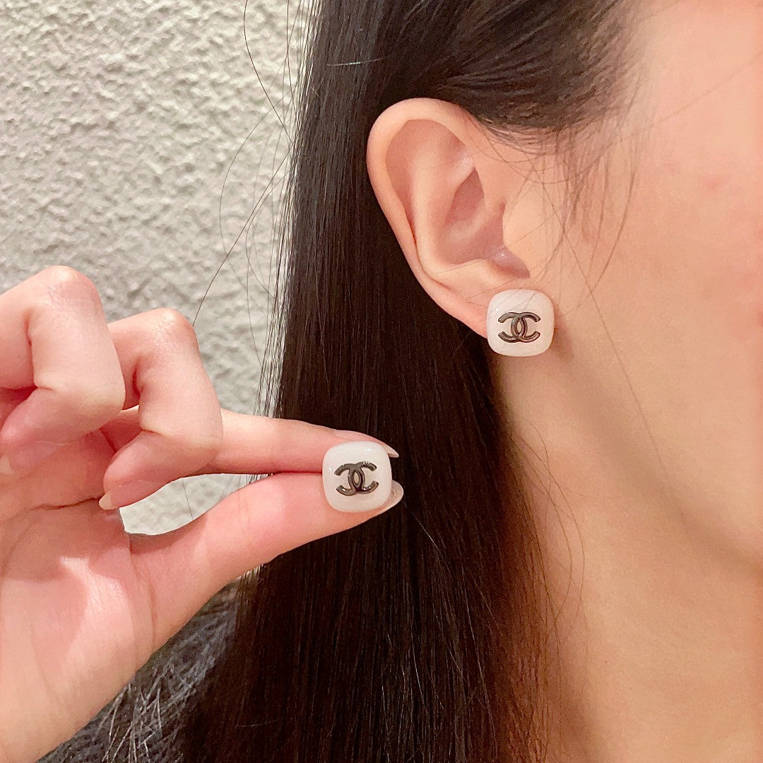 Martin Graham stud earrings in polished metal-tone – main product view