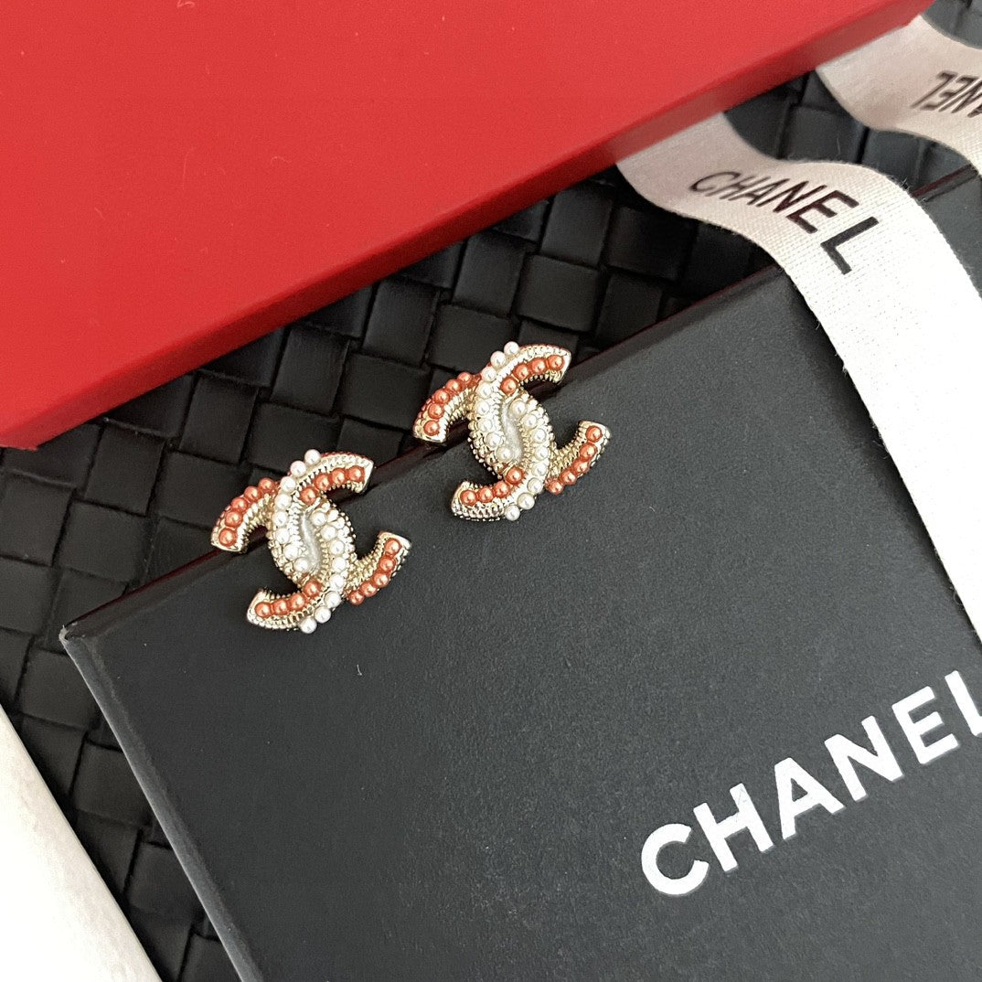 Martin Graham stud earrings in polished metal-tone – main product view