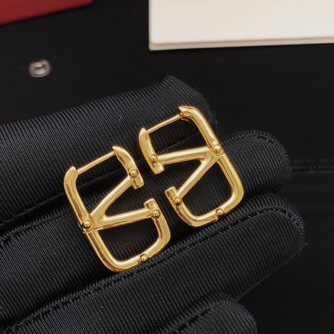 Martin Graham drop earrings in polished metal-tone – main product view