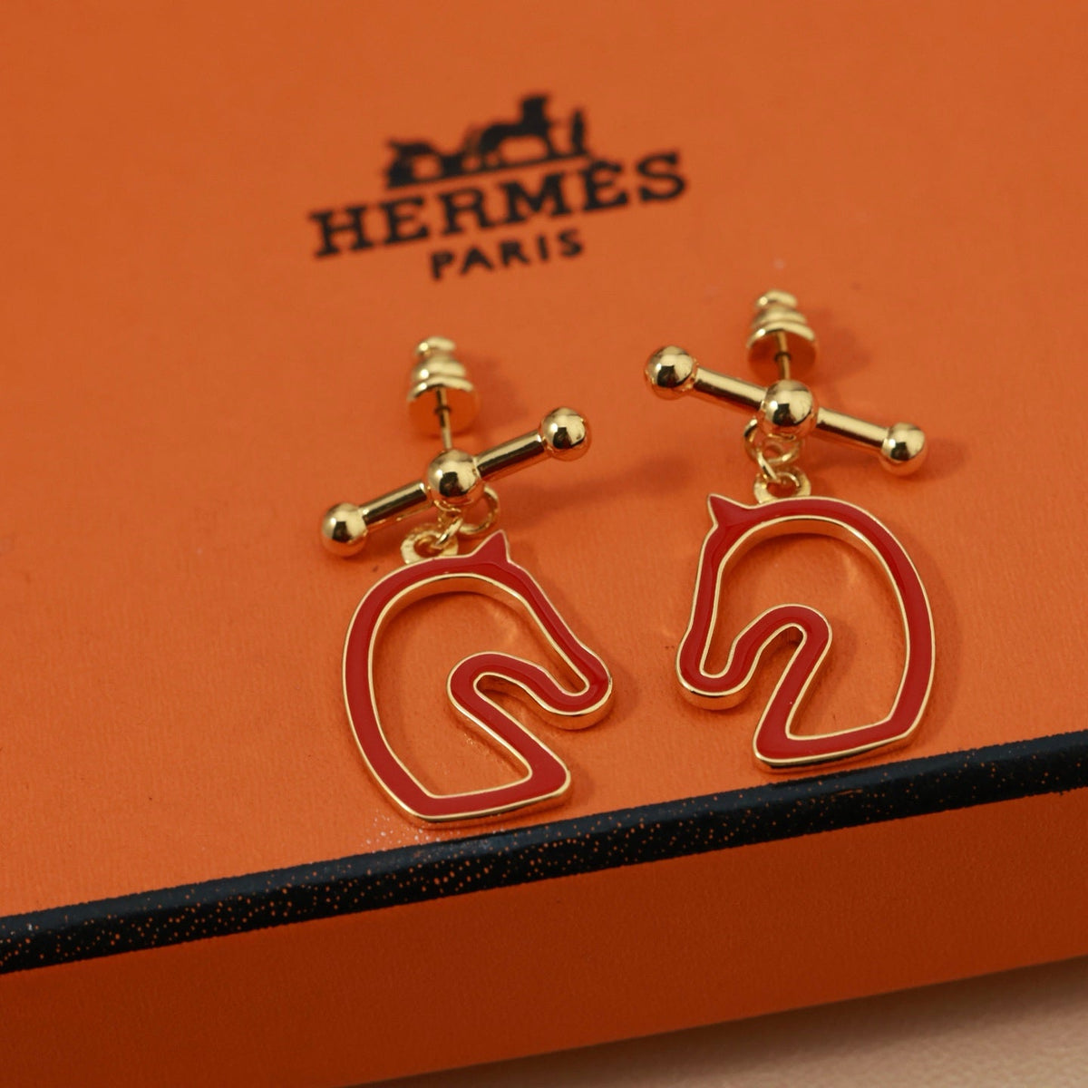 Martin Graham stud earrings in polished metal-tone – main product view