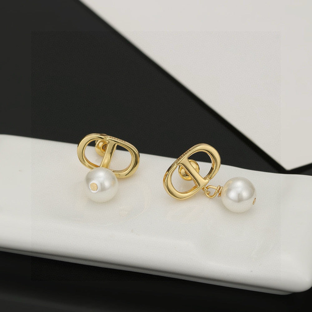 Martin Graham stud earrings in polished metal-tone – main product view