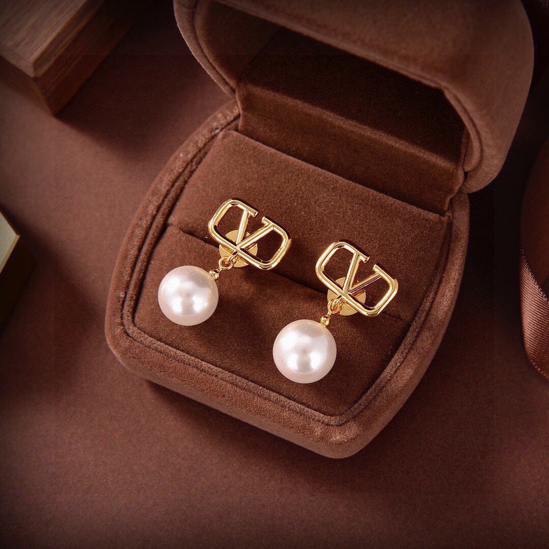Martin Graham stud earrings in polished metal-tone – main product view
