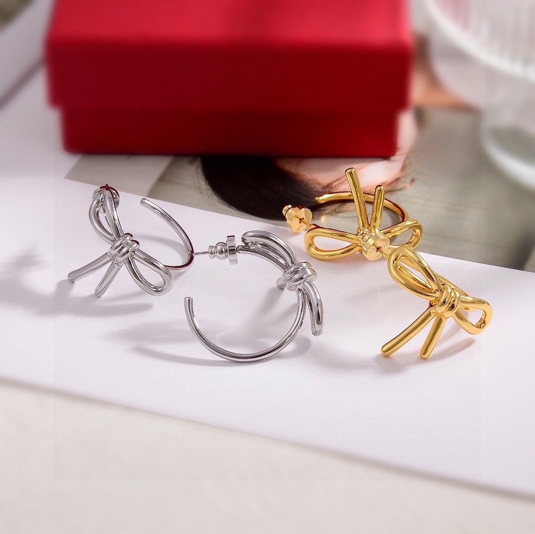 Martin Graham stud earrings in polished metal-tone – main product view