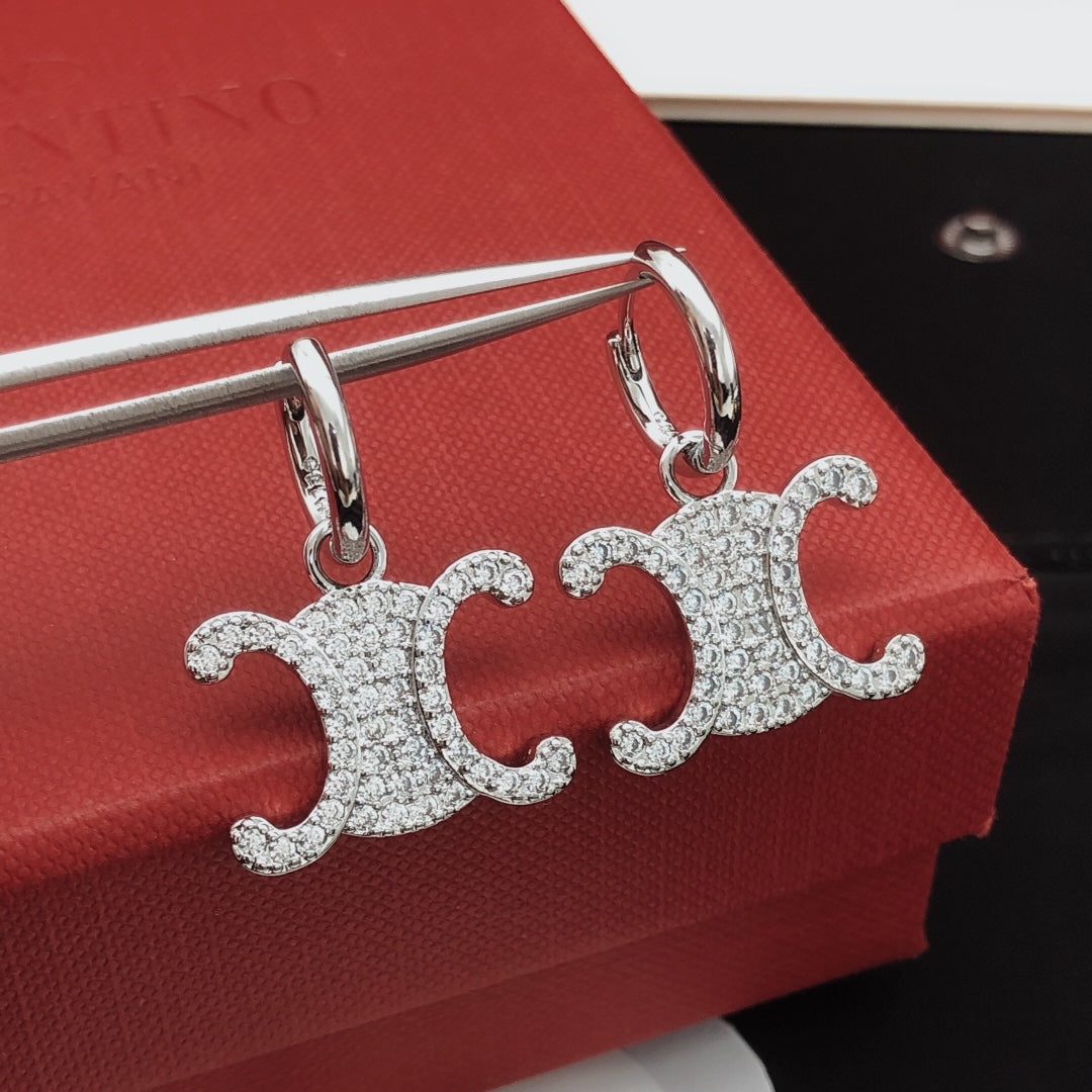 Martin Graham drop earrings in polished metal-tone – main product view