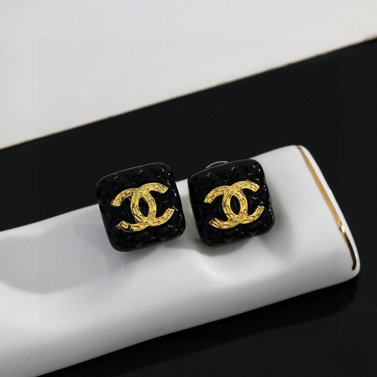 Martin Graham stud earrings in polished metal-tone – main product view
