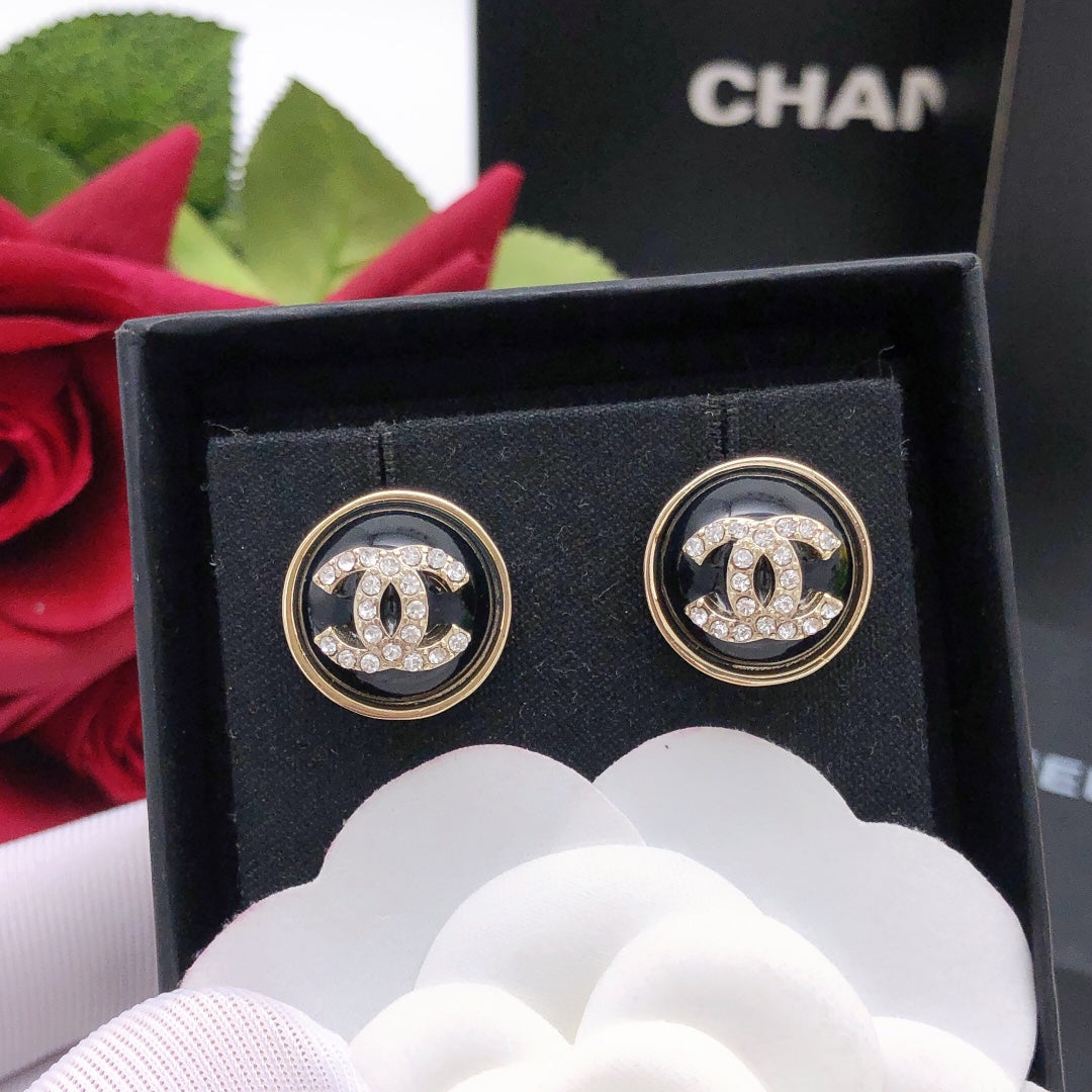 Martin Graham stud earrings in polished metal-tone – main product view