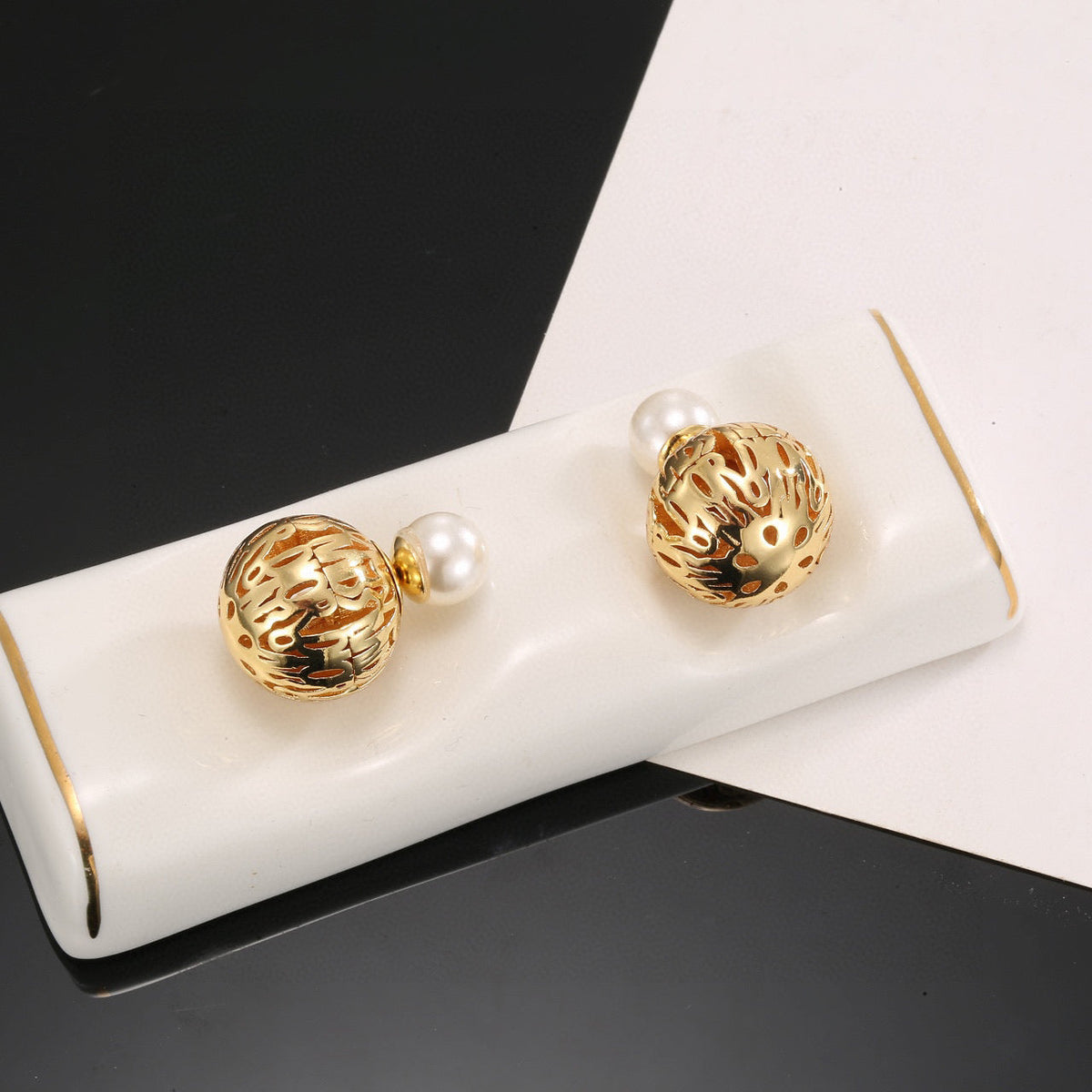 Martin Graham earrings in polished metal-tone – main product view