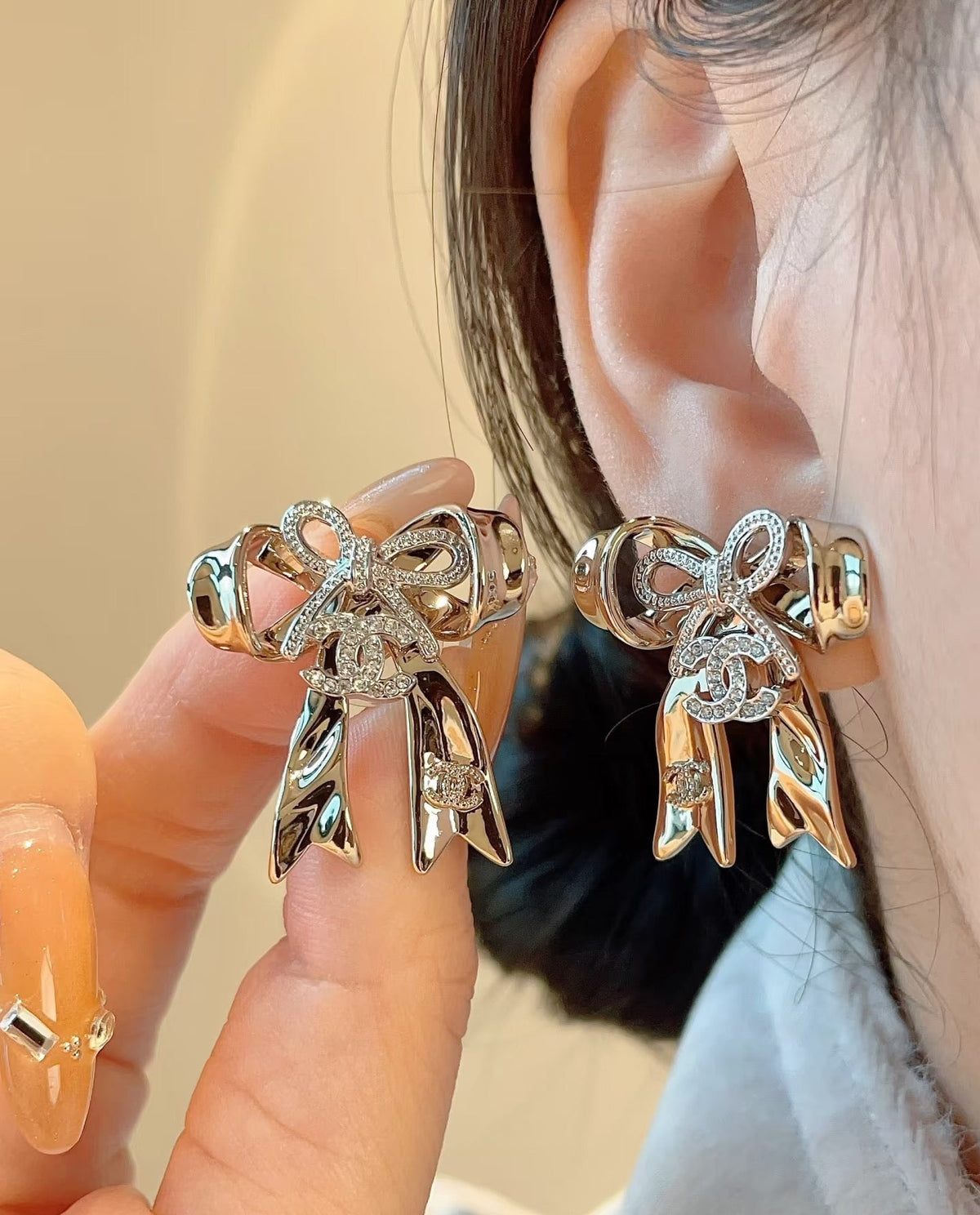 Martin Graham stud earrings in polished metal-tone – main product view