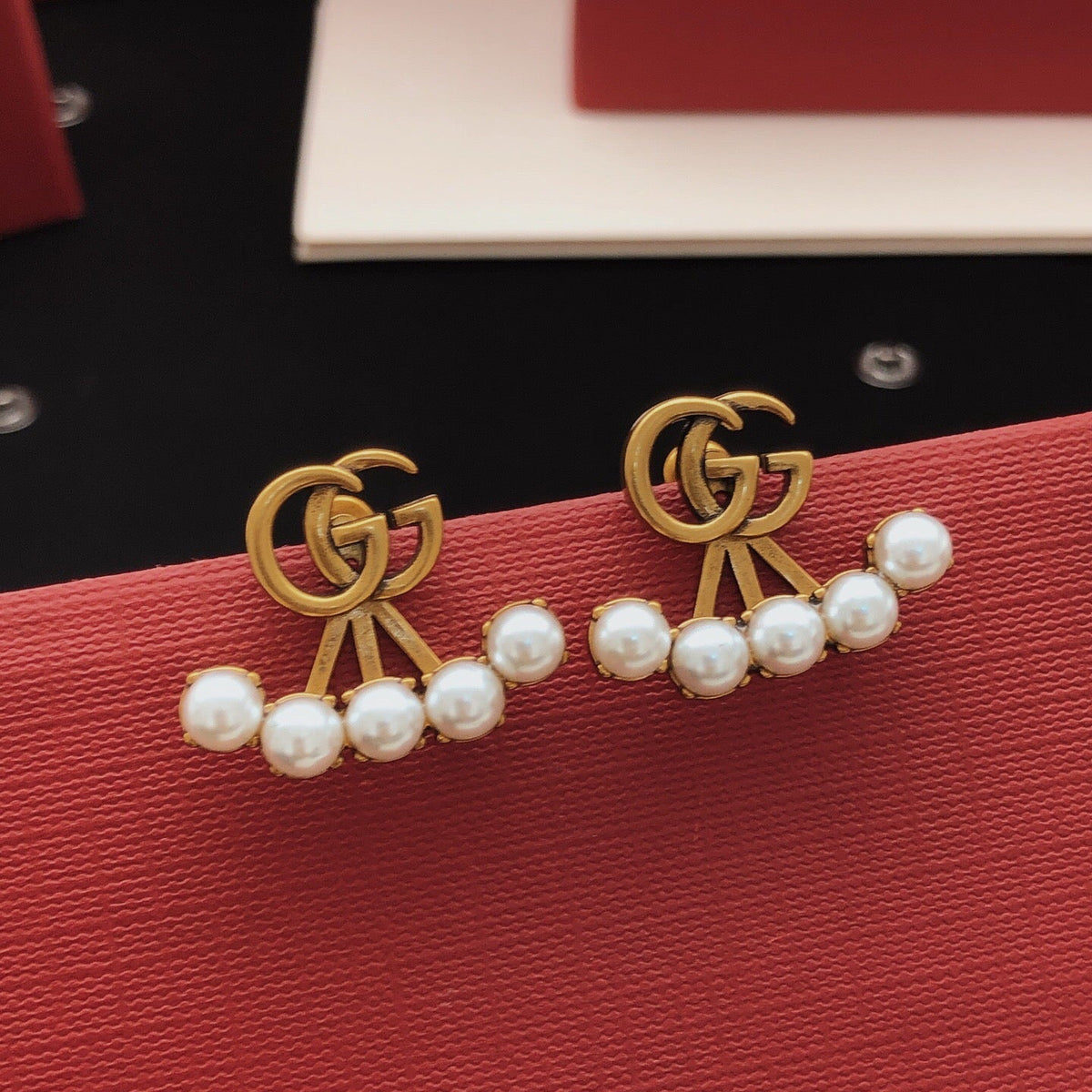Martin Graham stud earrings in polished metal-tone – main product view