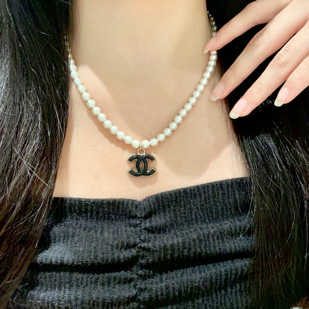 Martin Graham pendant necklace in polished metal-tone – main product view