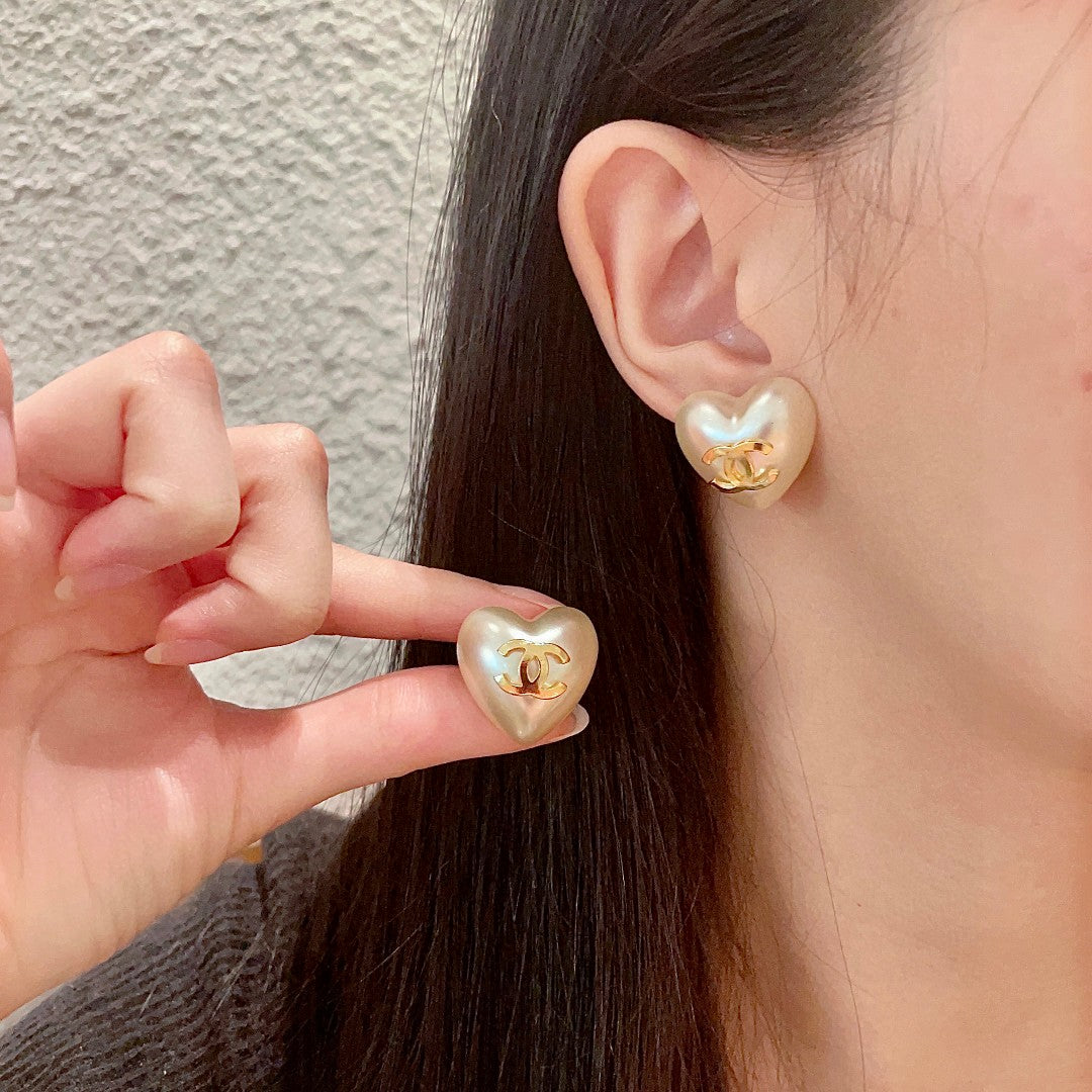 Martin Graham stud earrings in polished metal-tone – main product view