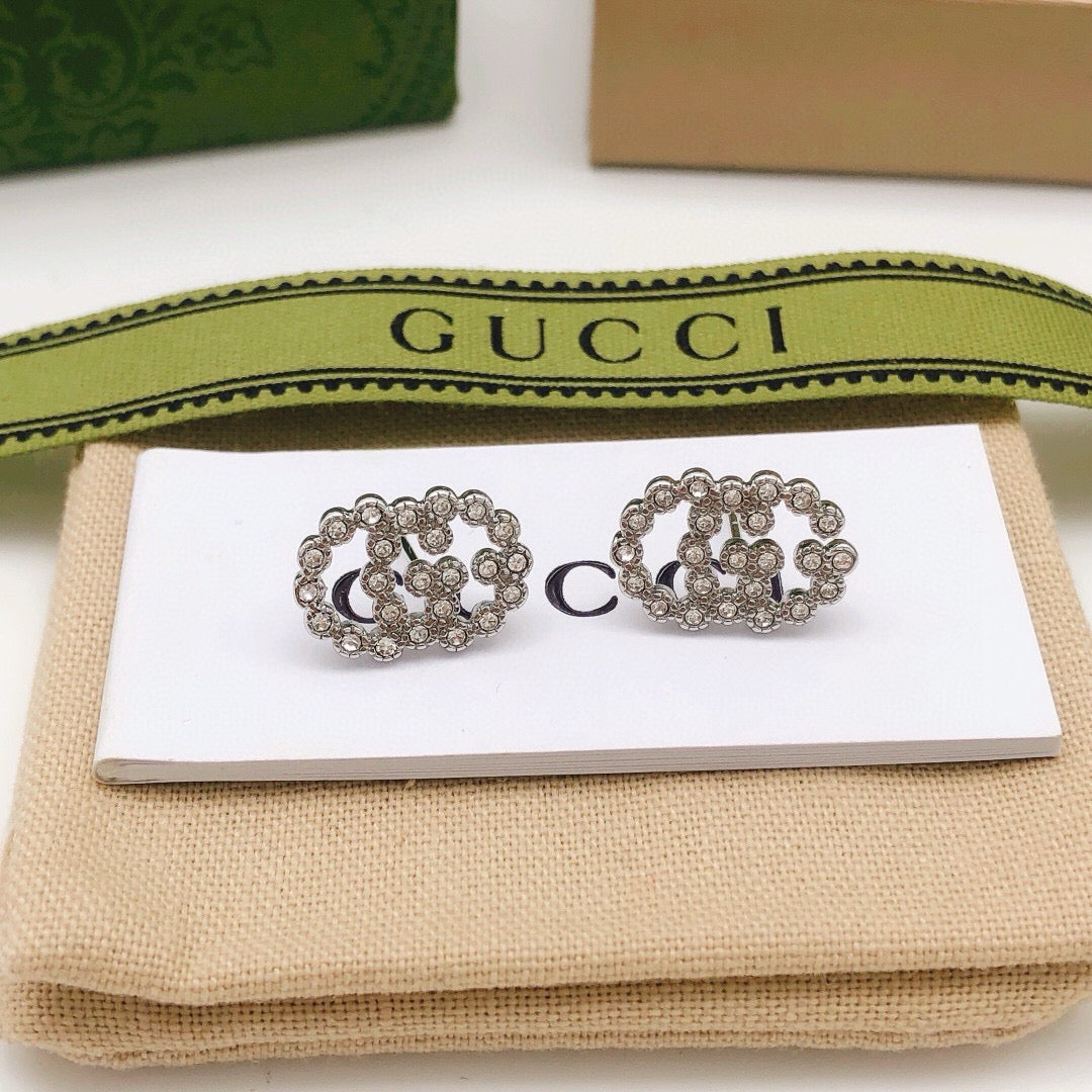 Martin Graham stud earrings in polished metal-tone – main product view