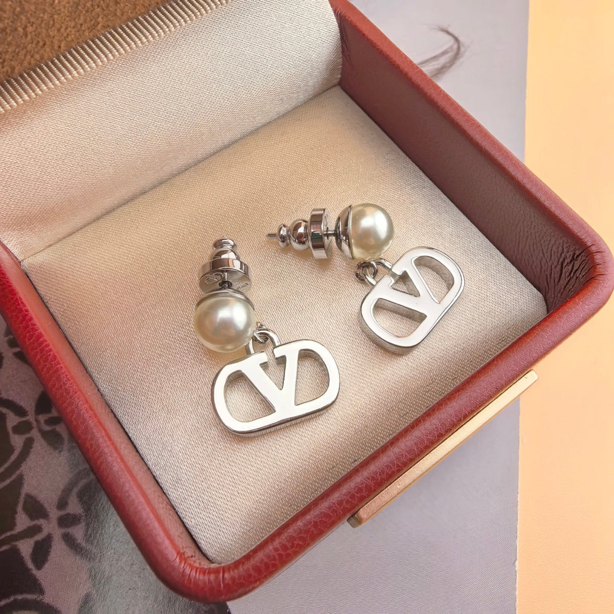 Martin Graham stud earrings in polished metal-tone – main product view