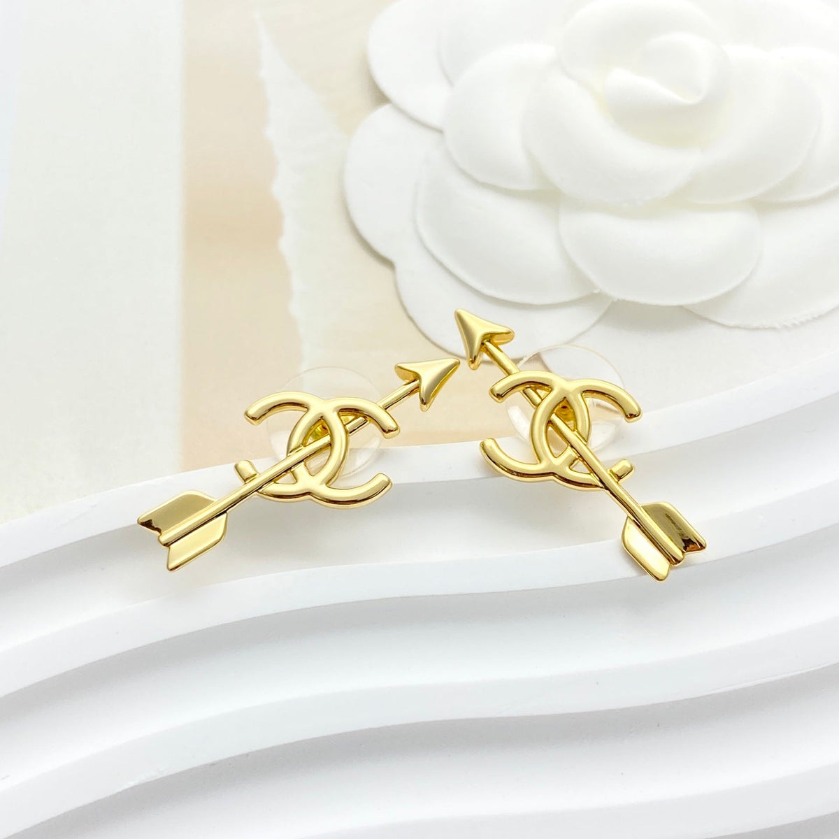 Martin Graham stud earrings in polished metal-tone – main product view
