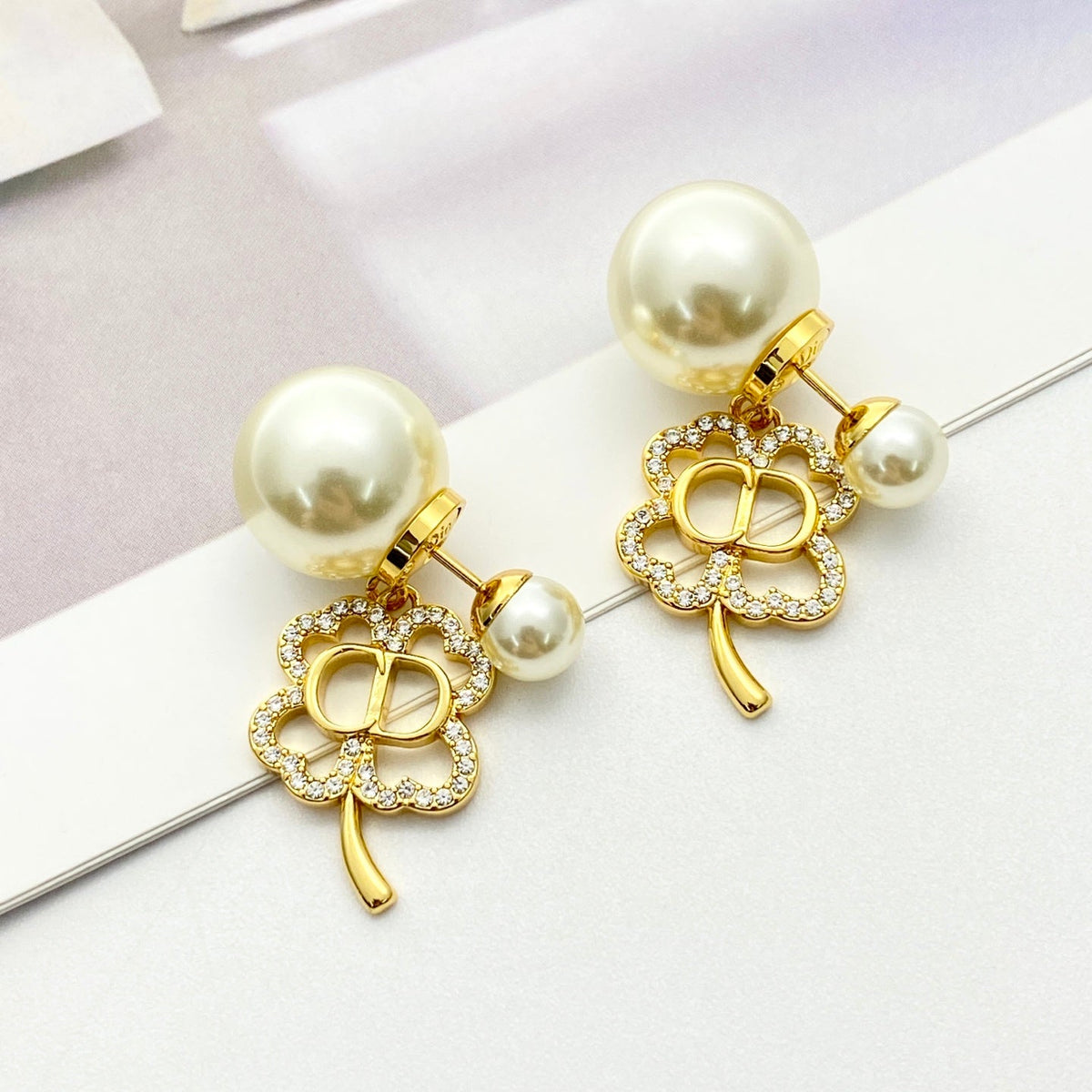 Martin Graham stud earrings in polished metal-tone – main product view