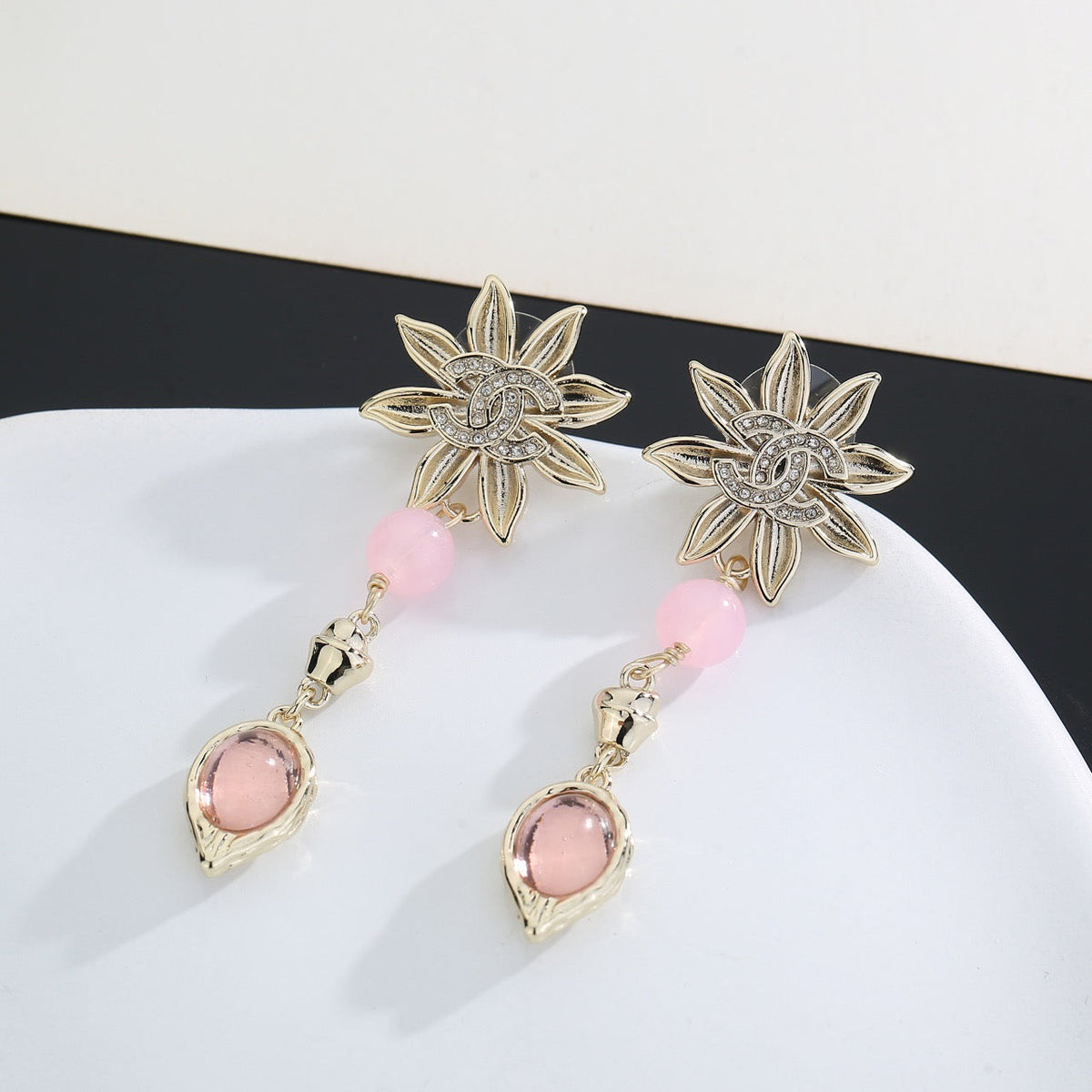 Martin Graham stud earrings in polished metal-tone – main product view