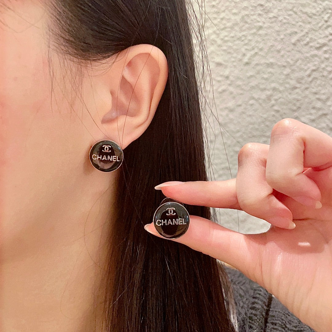Martin Graham stud earrings in polished metal-tone – main product view