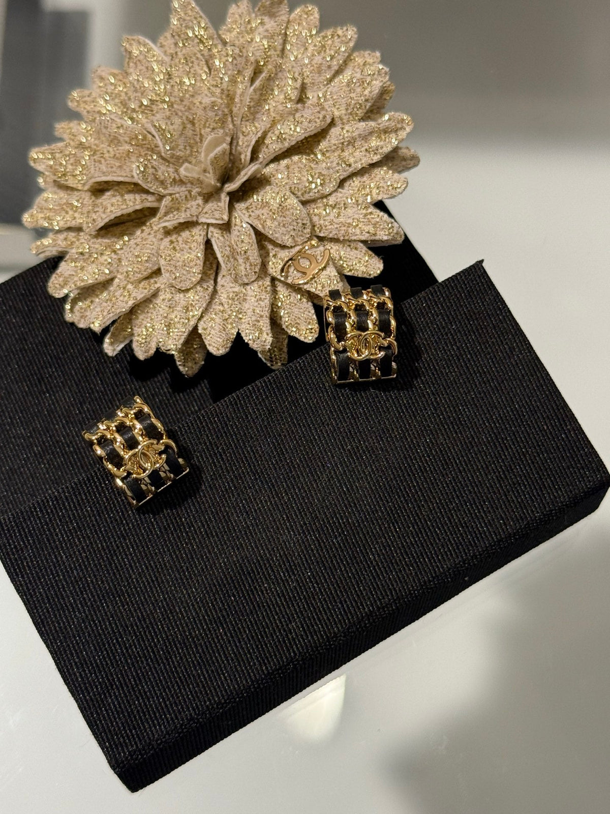 Martin Graham stud earrings in polished metal-tone – main product view