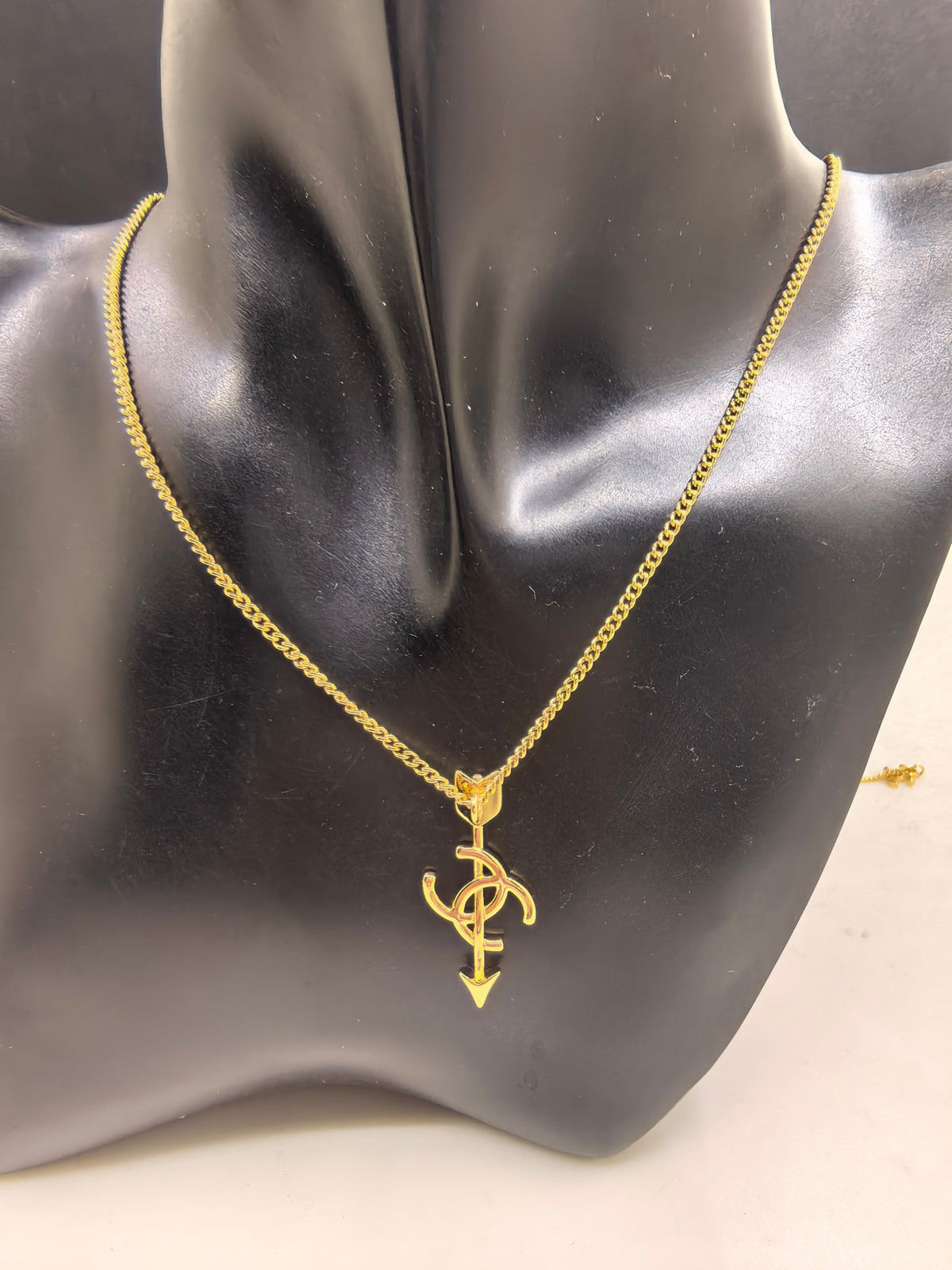 Martin Graham pendant necklace in polished metal-tone – front product view