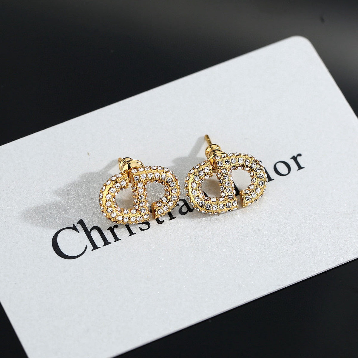 Martin Graham stud earrings in polished metal-tone – main product view