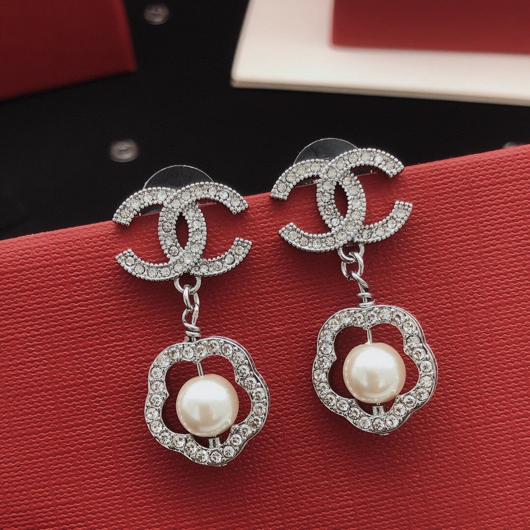Martin Graham stud earrings in polished metal-tone – main product view