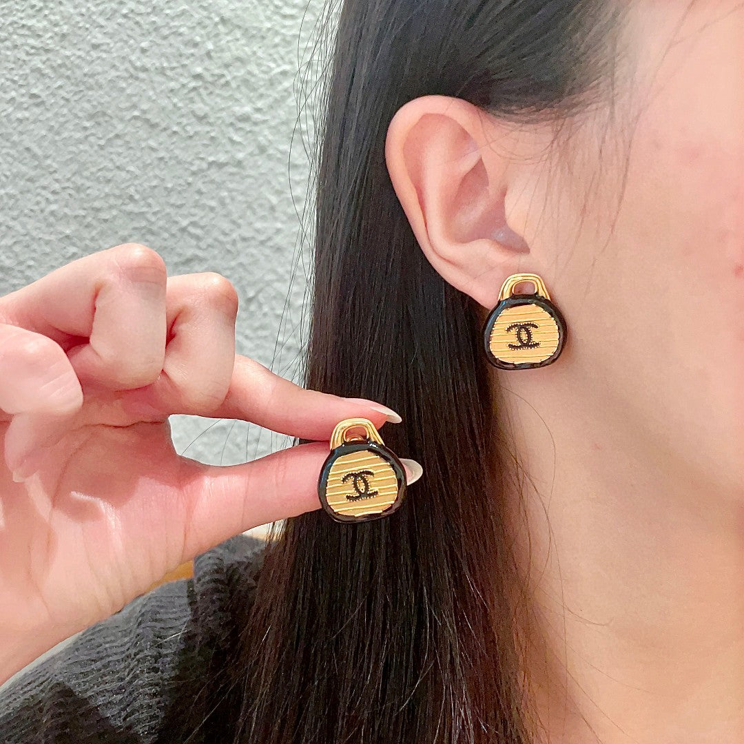 Martin Graham stud earrings in polished metal-tone – main product view