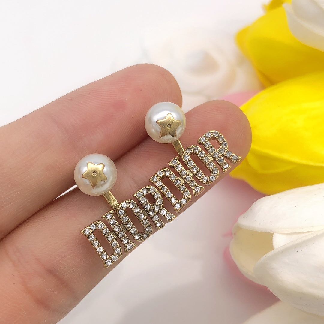 Martin Graham stud earrings in polished metal-tone – main product view